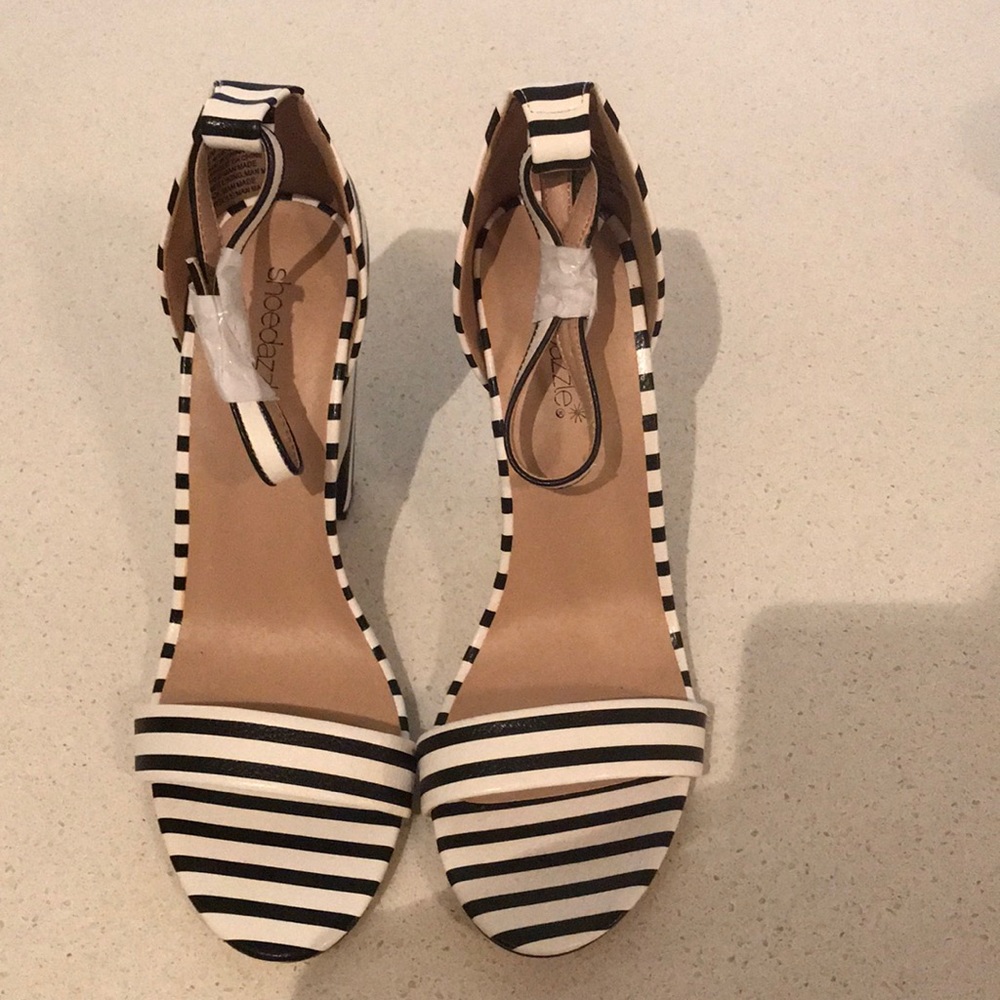 Brand new Size 9 Black and White Ankle Strap Heel